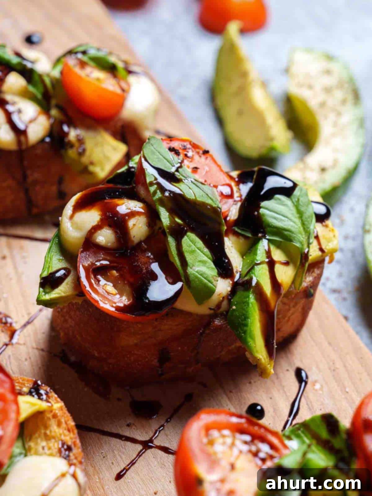Zesty Caprese Crostini with Smoky Grilled Avocado 10 Grilled Avocado Caprese Crostini infused with olive oil and piled high with Caprese flavours!