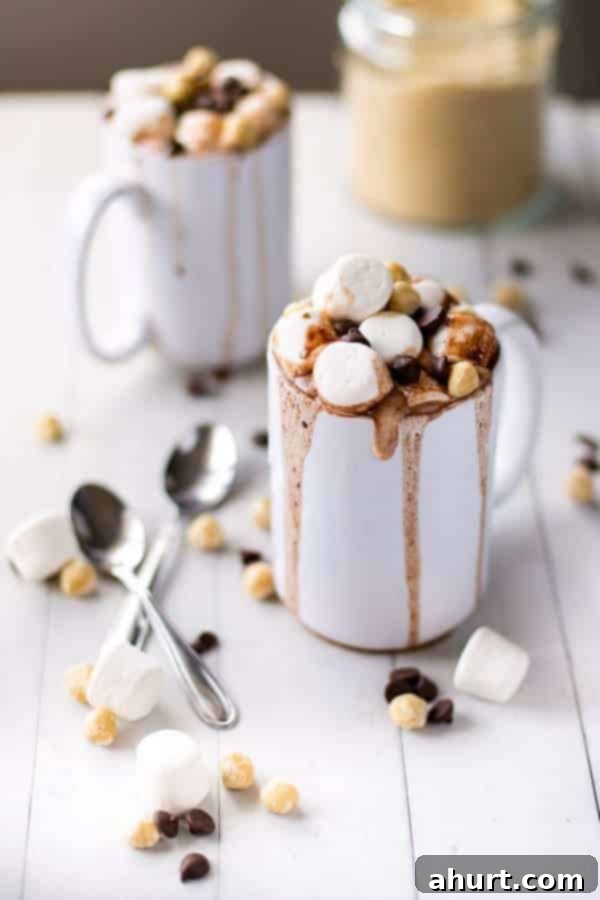 Nutella Hot Chocolate in a cup, topped with fluffy marshmallows