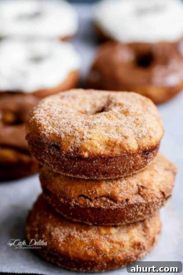 Warm Banana Bread Doughnuts, Bursting with Nutella 4 3 pieces banana bread donuts stack covered in cinnamon sugar