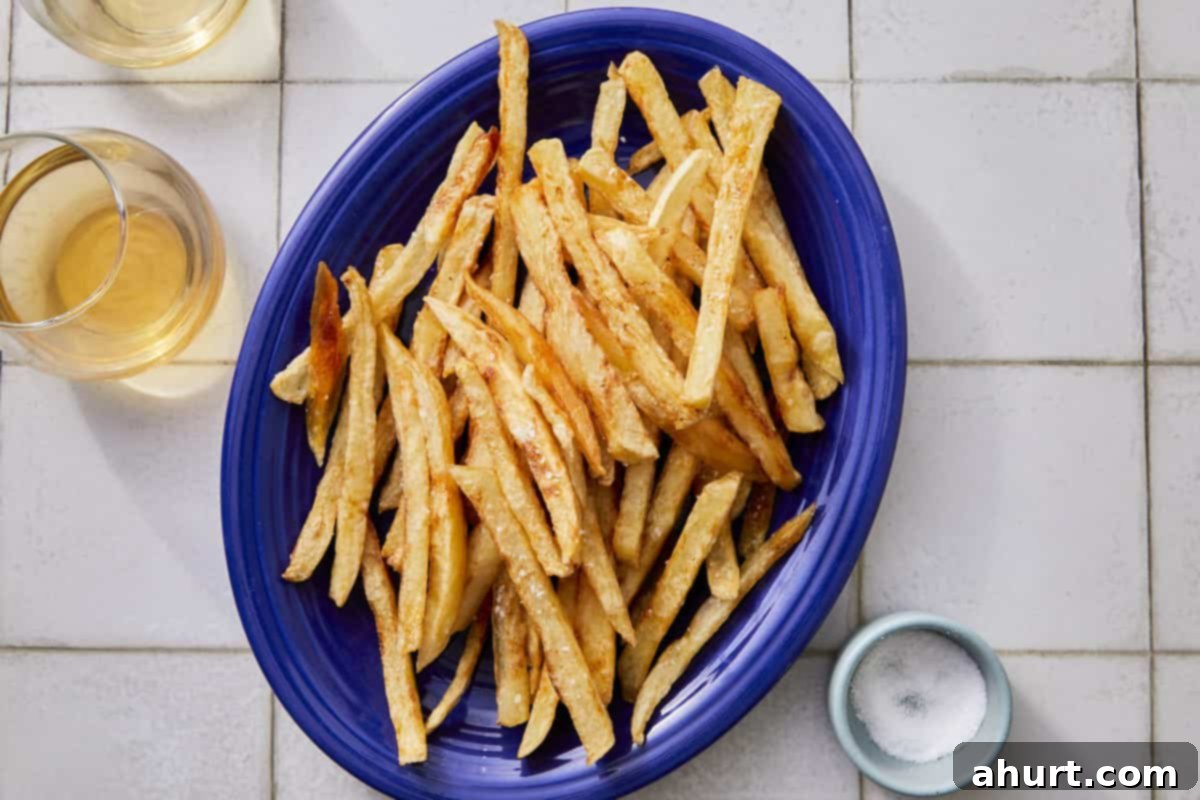 Golden Crispy Fries 7 crispy fries in a blue bowl