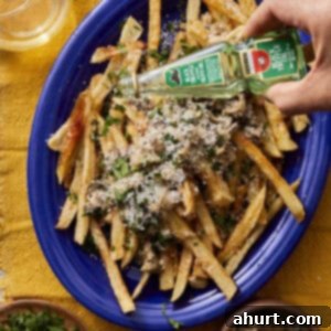 Handcrafted Truffle Fries 13 A dish of perfectly prepared homemade truffle fries.