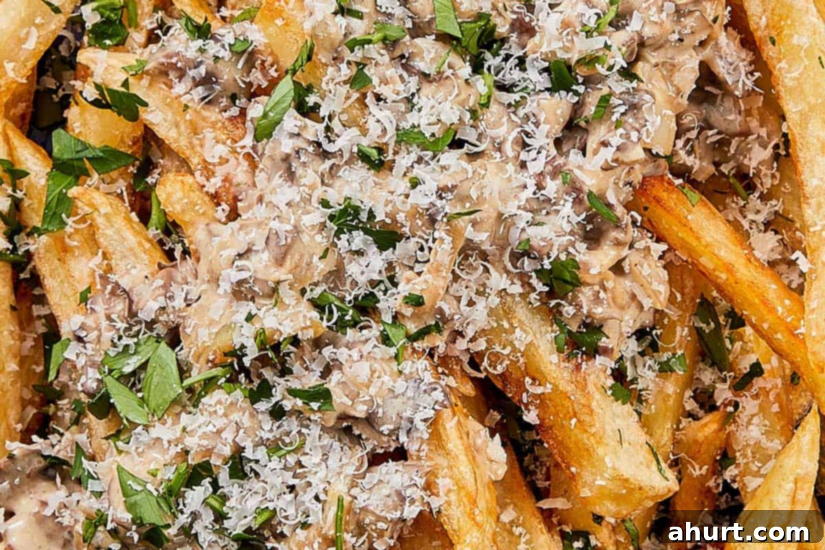 Handcrafted Truffle Fries 10 Freshly fried crispy fries topped generously with mushroom truffle sauce, Parmesan, and parsley.