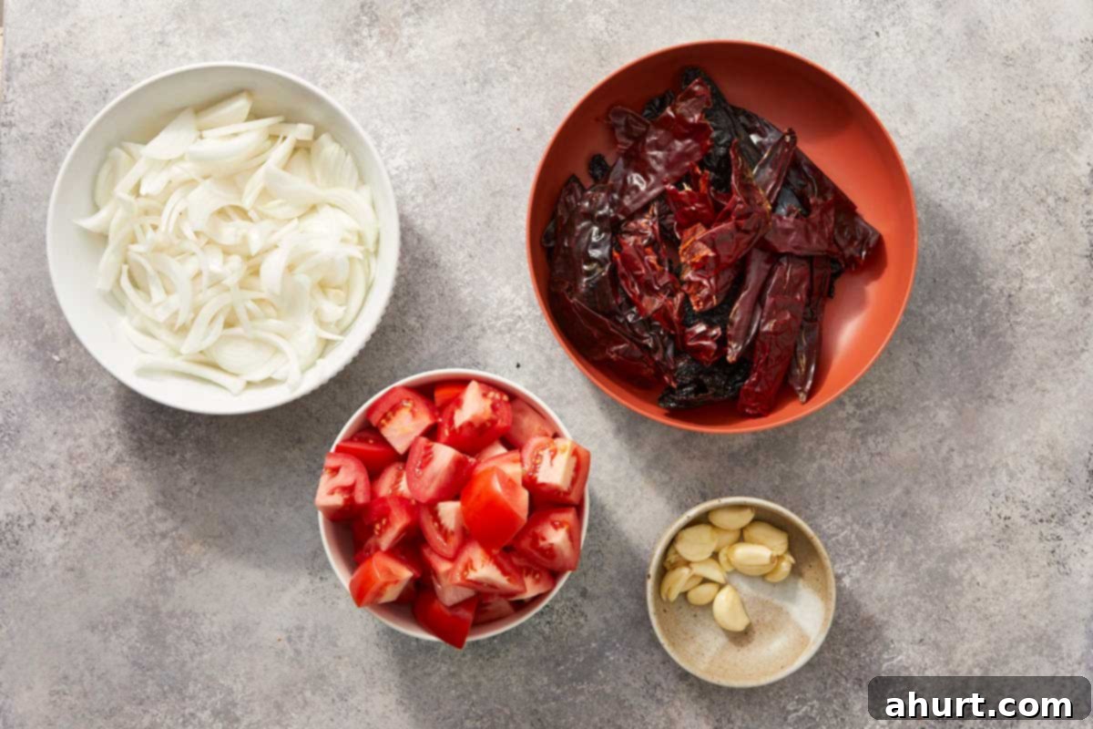 Birria Tacos Simplified 4 Bowls of prepped ingredients.