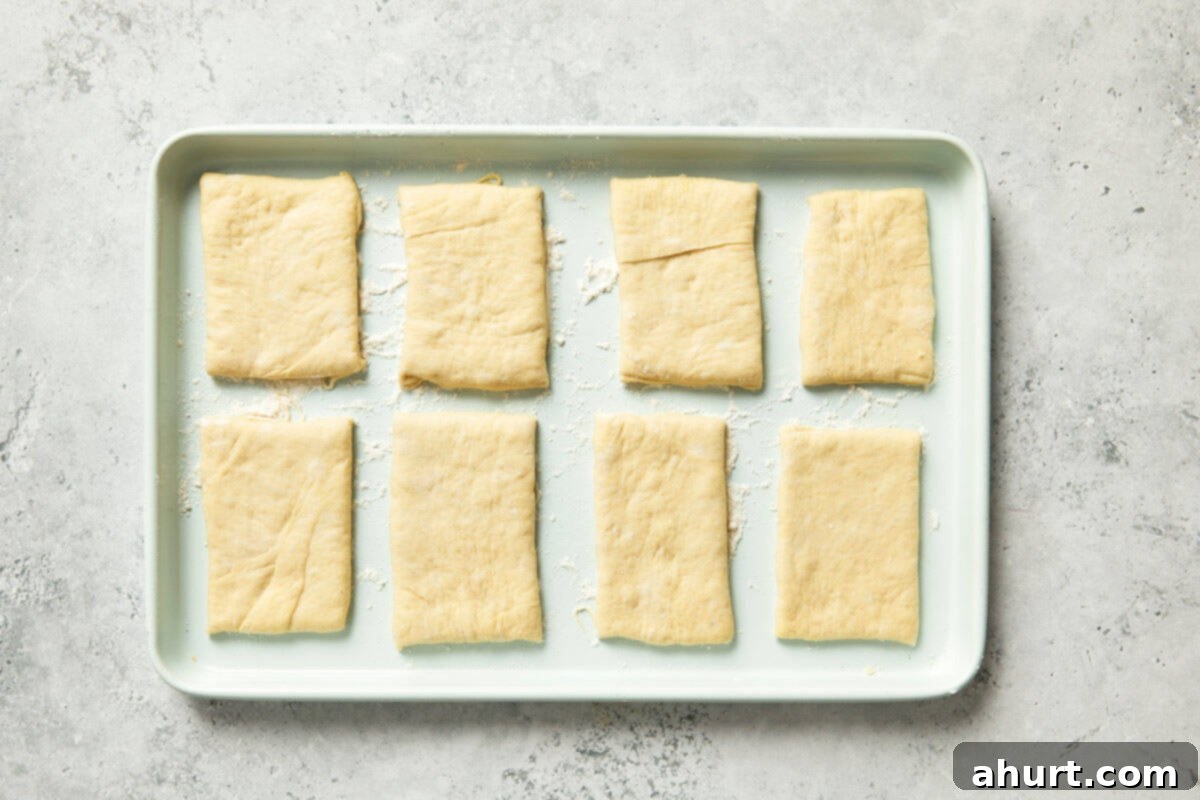 Spanish Tomato Pan Coca 9 Rolled-out dough cut into even rectangles.