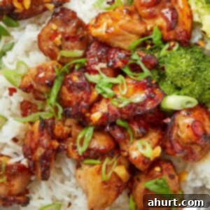 Crispy Air Fryer Teriyaki Chicken Thighs 11 Air fryer teriyaki chicken served over rice with broccoli and sliced green onions