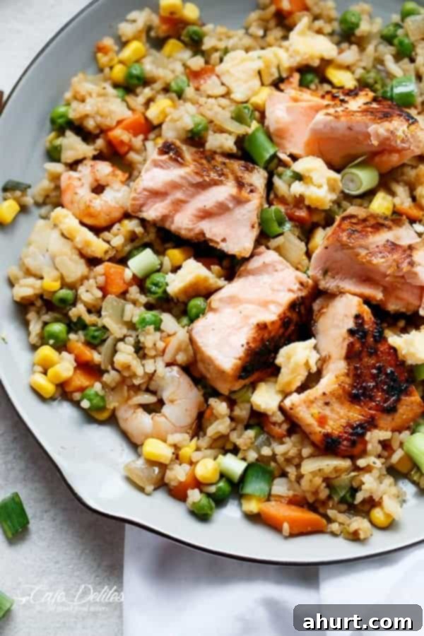 Top view zoom in image of Seared Salmon And Prawn Fried Rice 