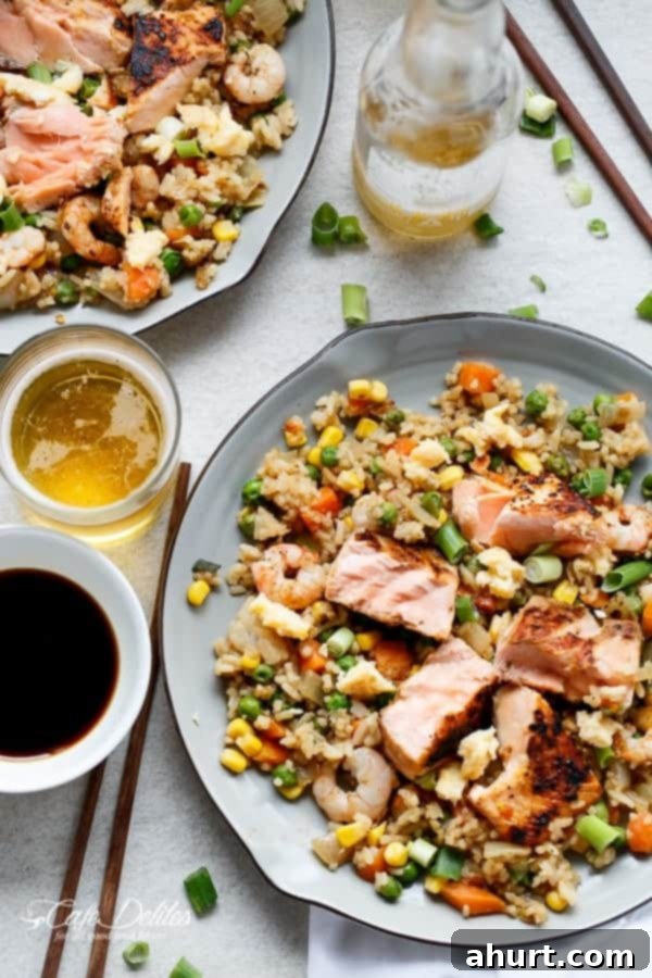 Top view image of Seared Salmon And Prawn Fried Rice 