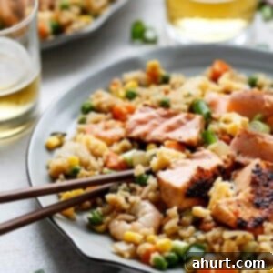 Pan-Seared Salmon and Shrimp Fried Rice 7 Seared Salmon and Prawn Fried Rice on a plate