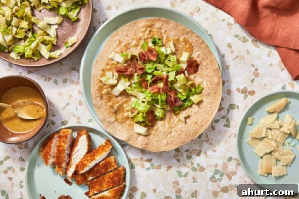 Signature Crispy Caesar Wrap 15 Layering dressed lettuce, bacon, chicken, and Parmesan on a tortilla.
