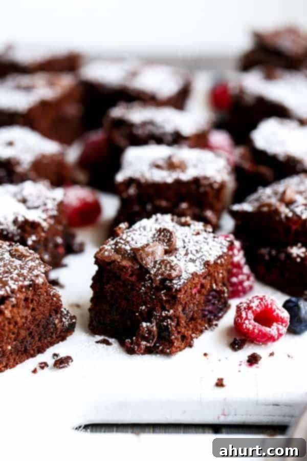 Berry Burst Nutella Swirl Brownies 13 Side view image of Mixed Berry Nutella Brownies pieces