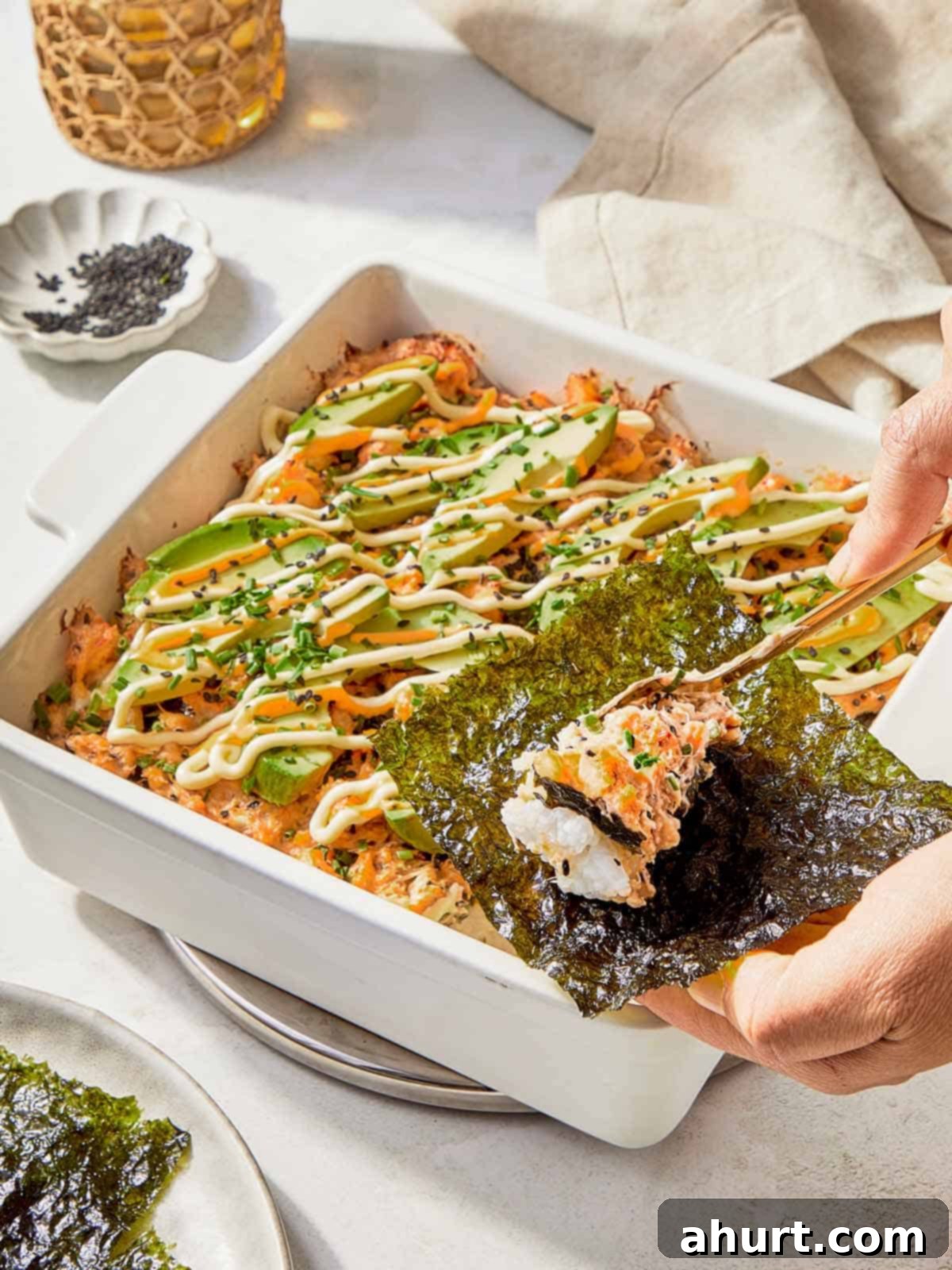 Easy At-Home Sushi Bake 12 Sushi piece with seaweed, highlighting a delicious sushi bake dish.