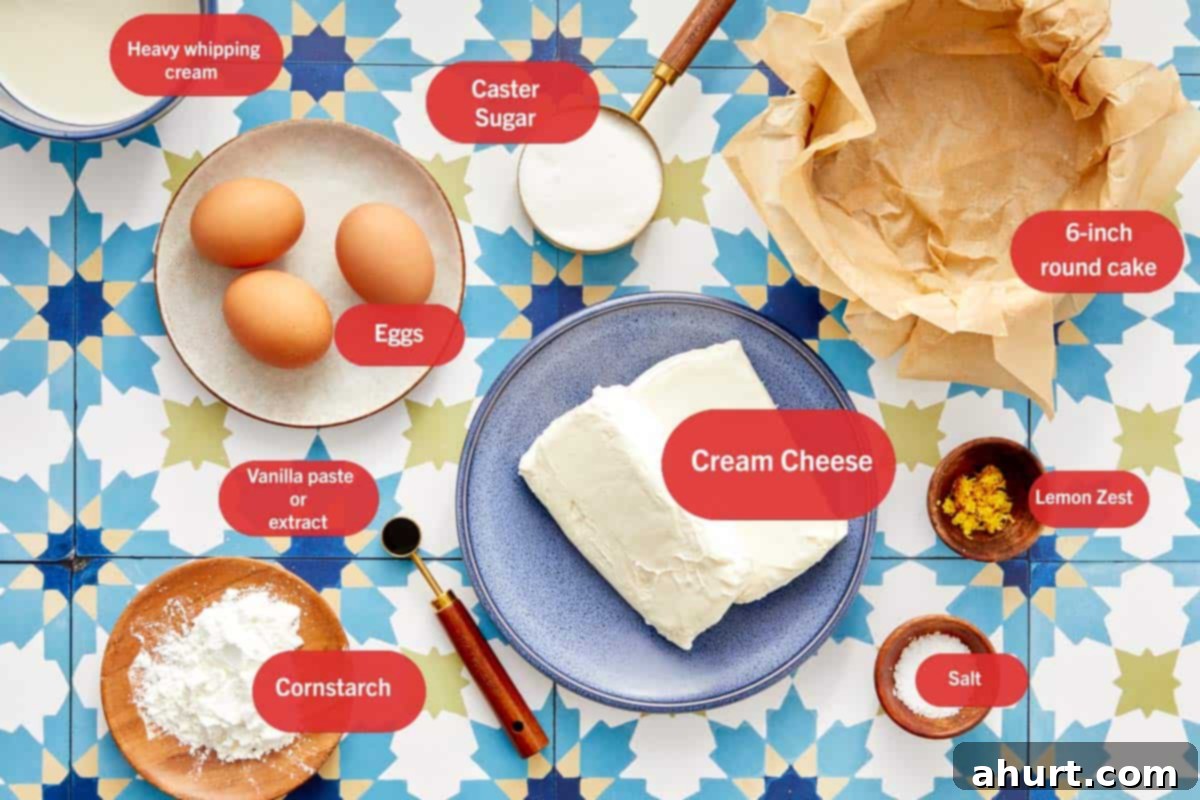 Burnt Basque Cheesecake 3 Ingredients for Basque cheesecake laid out on a patterned surface with labels, including low-fat cream cheese, eggs, and heavy cream