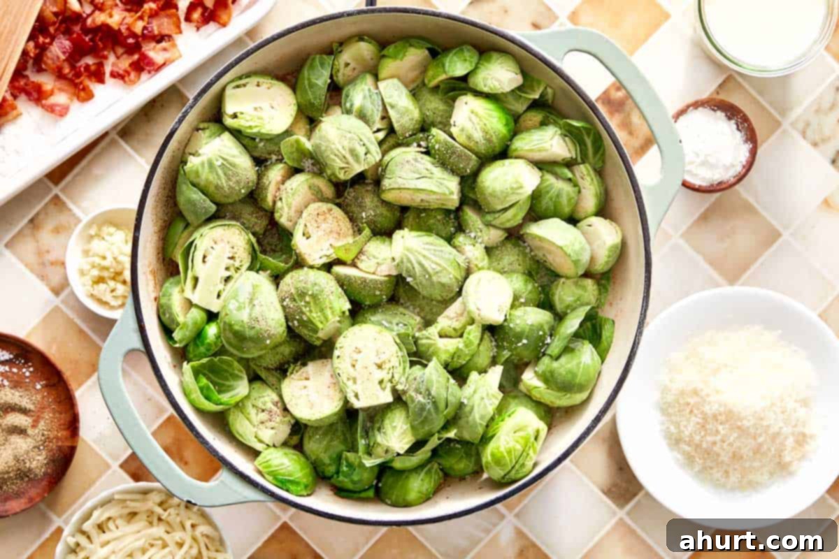 Smoky Bacon Brussels 7 Fresh Brussels sprouts, halved and seasoned, are spread in a single layer in the skillet, ready to be sautéed.