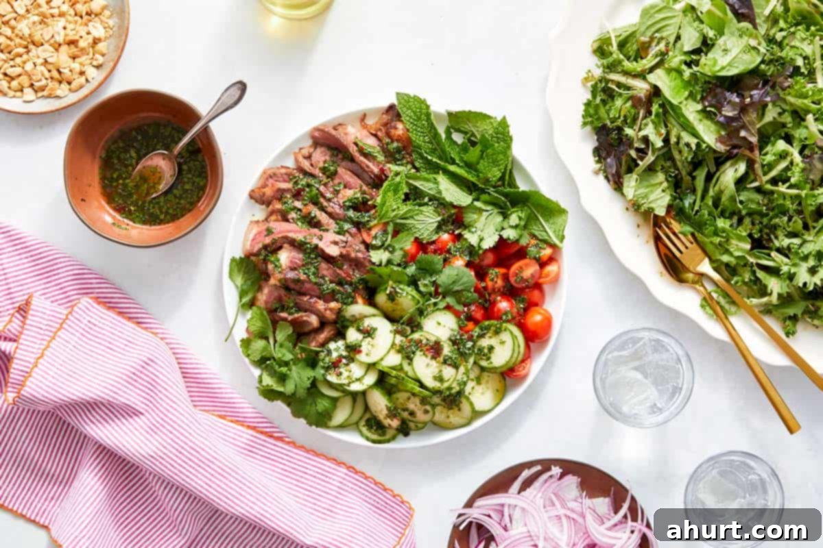 Vibrant Thai Beef Salad 13 A beautifully assembled Thai Beef Salad with sliced steak, fresh vegetables, drizzled with dressing and garnished.