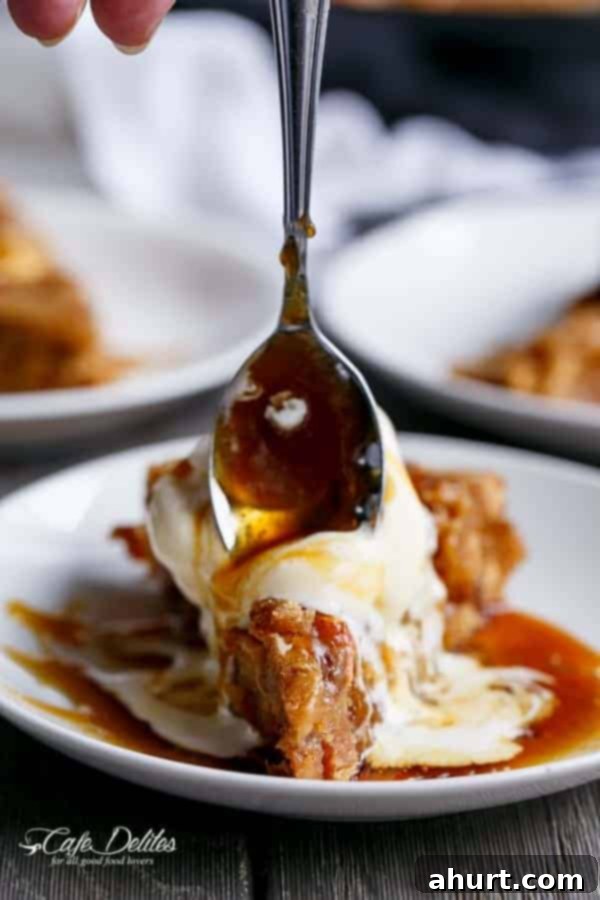 Giant Apple Pie Skillet Cookie 8 A piece taken out from Apple Pie Deep Dish Cookie Dough Blondies with spoon