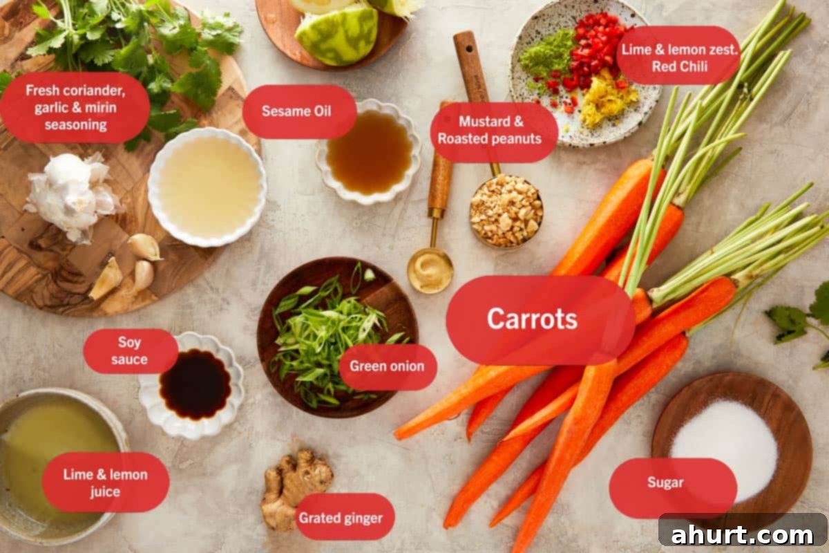 Ginger Peanut Carrot Slaw 3 Top-down shot showcasing all the fresh ingredients laid out for the Asian Carrot Salad, including carrots, citrus, ginger, chili, and various dressing components