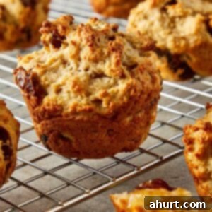 a side view of a muffin on a wire rack cooling
