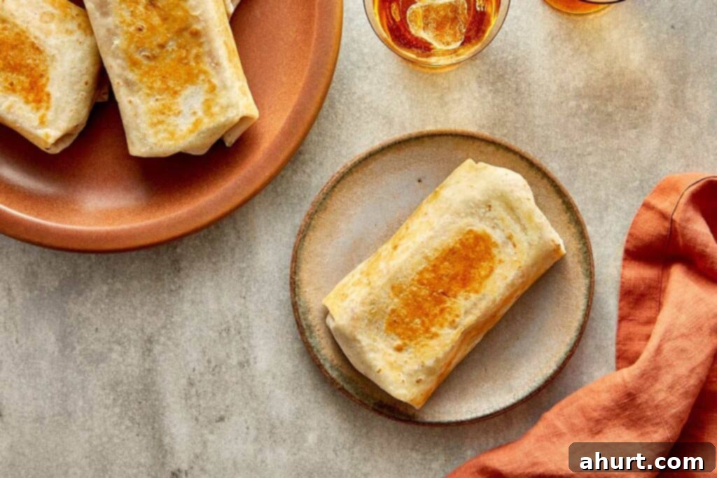 Cheeseburger Bliss Wrap 19 A plate of toasted tortilla wraps and a single wrap toasted.