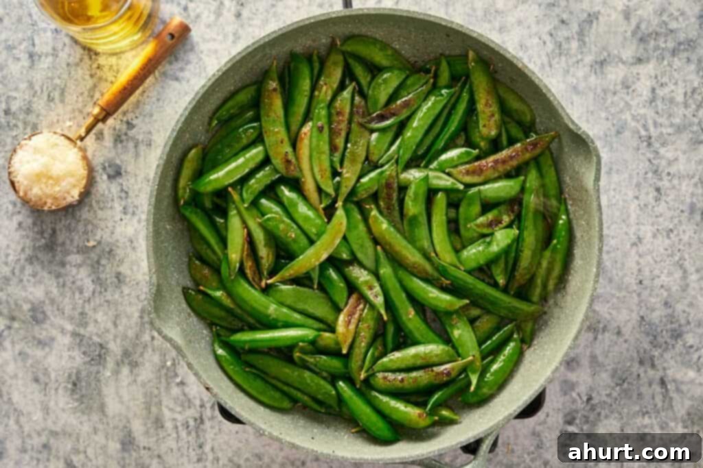 Keto Cacio e Pepe Delight 5 Adding sugar snap peas to the pan