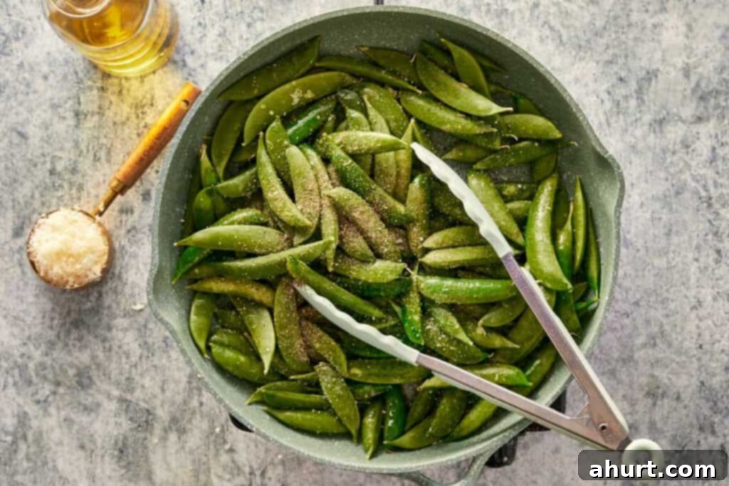 Keto Cacio e Pepe Delight 6 Seasoning and sautéing sugar snap peas