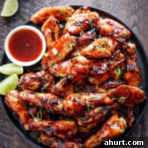 Halftime Heat: Super Bowl LXI Feast 4 Sticky Thai Chicken Wings on a platter