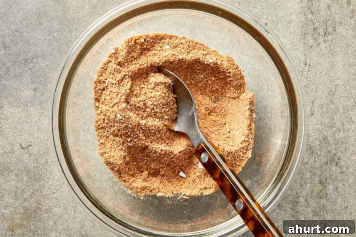 garlic parmesan wings seasoning mix with spices and baking powder in bowl